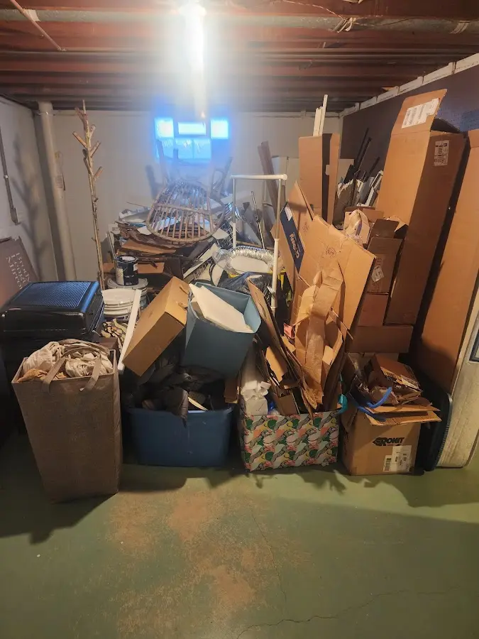 Roll-off dumpster container at job site for Yard Waste Dumpster Rental in Woodland Park